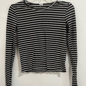 Black and white stripped long sleeve shirt. Thin material, in good condition.